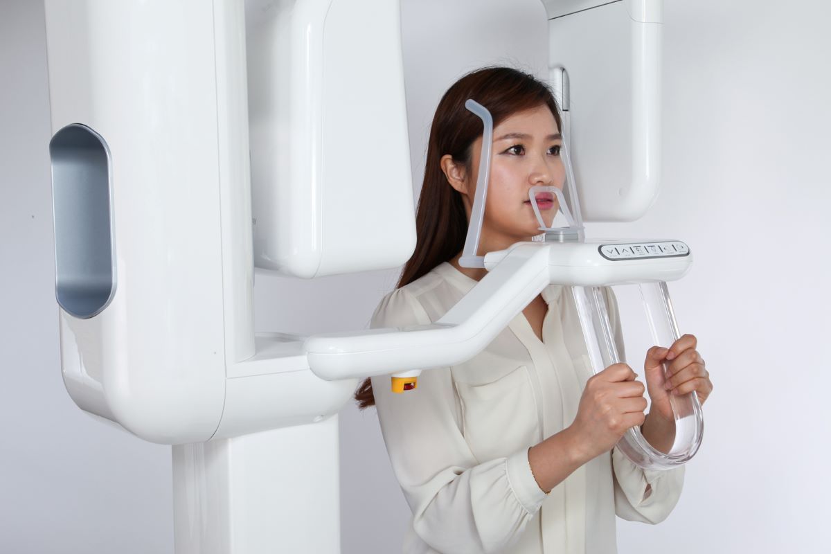 Позиционирование пациента томографа Volux 55 Genoray 1